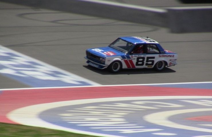 Adam Carolla racing his Datsun BRE 510 at Auto Club Speedway
