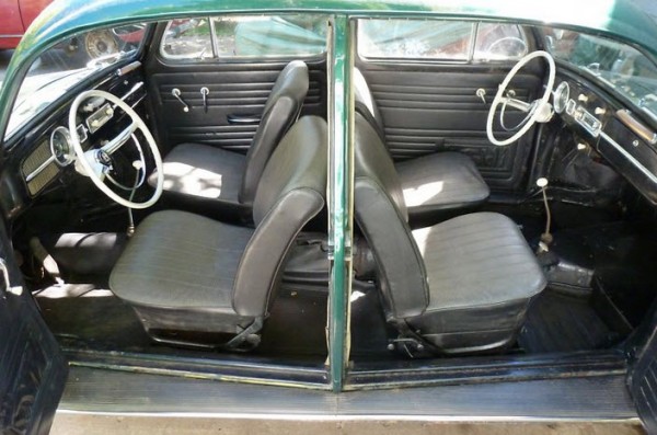 Opening the 1965 Beetle's suicide doors provides a full view of the mirror image Interior.