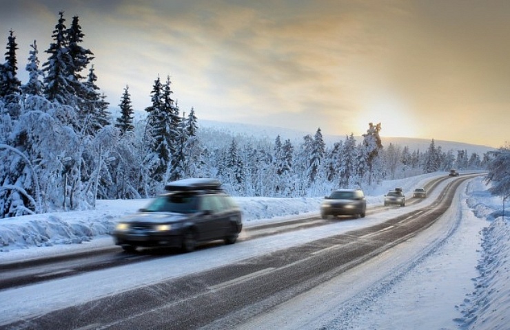 winter driving snow motion blur of car
