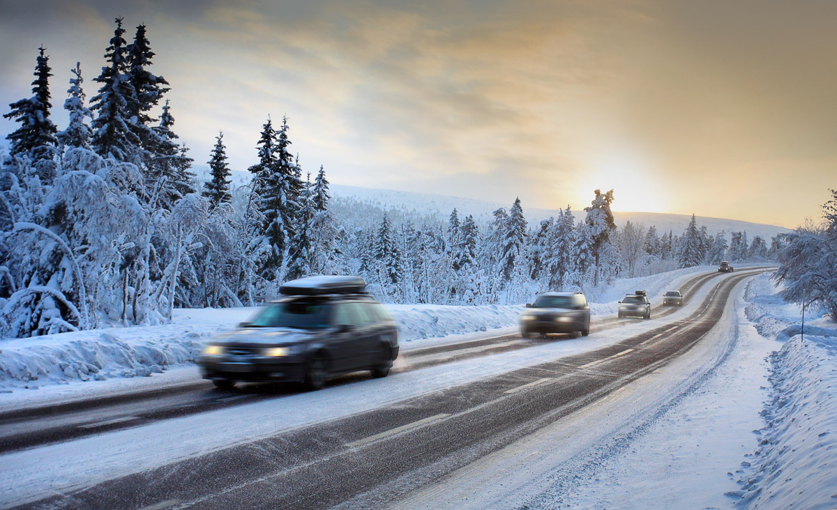 winter driving snow motion blur of car