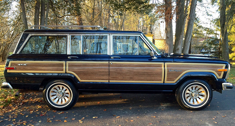 This Jeep Grand Wagoneer Grand's wood paneling is impeccable. 