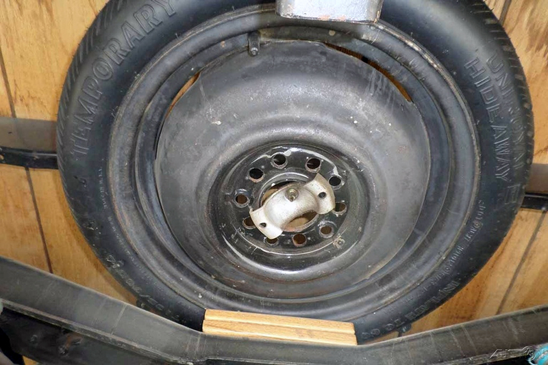 Here’s the underside of a restored 1935 Ford Flatbed packing a Chevy 307 cubic inch V8 under the hood and its spare tire under the cargo bed. http://www.ebay.com/itm/Ford-Flat-Bed-Oak-Side-Rails-Flat-Bed-Stake-Side-Truck-Street-Rod-/361671422205 