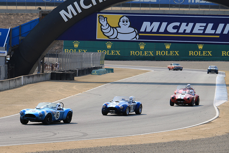 The cars on track at the Rolex Monterey Motorsports Reunion are not replicas. They’re the real deal. That means these Cobras mixing it up on track are worth millions.
