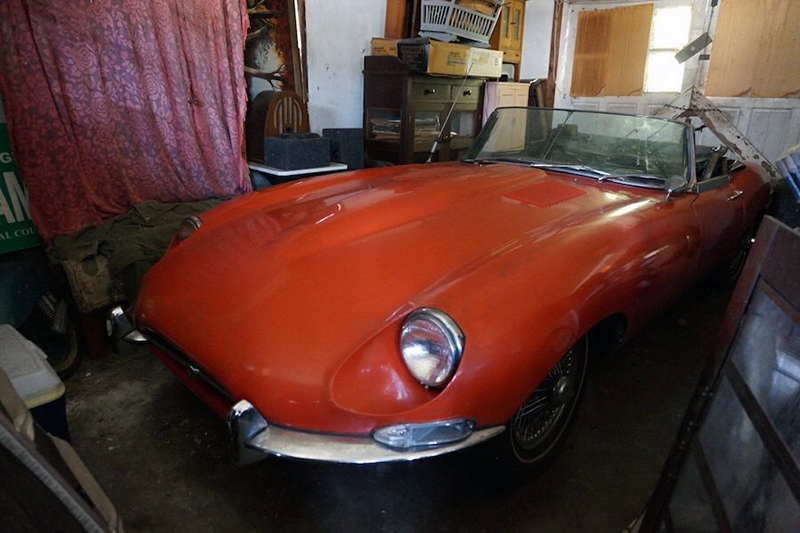 This unrestored barn-find 1961 Jaguar E-Type was certified by the Jaguar Heritage Trust.