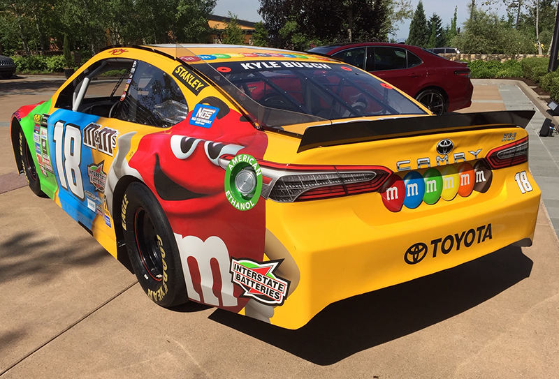 It's a race car, but it has Prius-like lines from the roof to the rear spoiler.