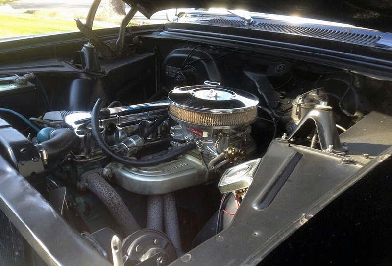 No, that’s not the stock mill, but it is an inline six. The 190 gave way to a built 250 six making about 200 horsepower. Note the Edelbrock carb.