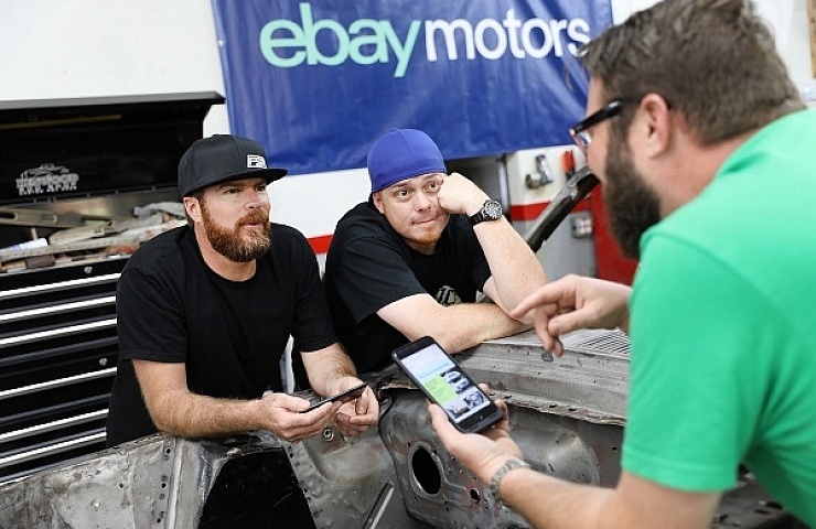 Mike Finnegan, K.C. Mathieu, and Rutledge Wood discussing the rebuild of 1967 Mustang Fastback