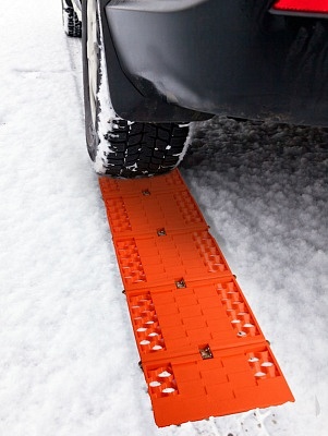 A good winter emergency kit includes items like a traction mat.