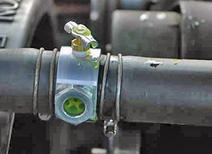 Use the bleeder valve to let out air trapped in the cooling system.
