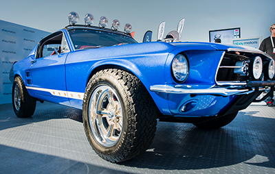 The Mustang’s luscious blue BASF Onyx metal-flake paint sparkled in the Nevada sun.