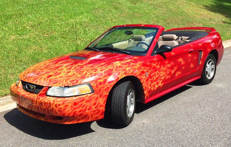 2000 Ford Mustang with flames