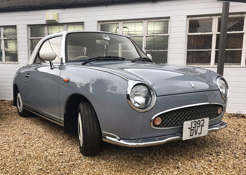 The British car is in Lapis Grey, and has just 25,000 miles on the odometer.