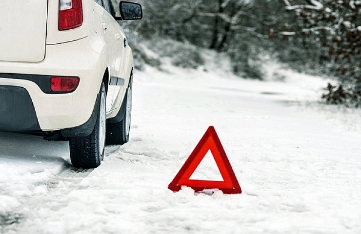 Car broken down on a cold winter day