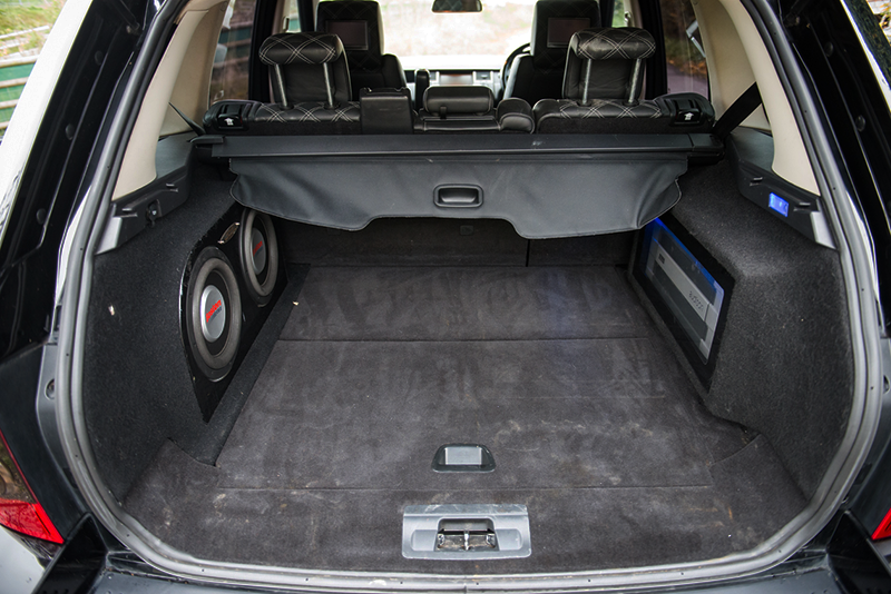 The Genesis stereo features these rear-mounted woofers.
