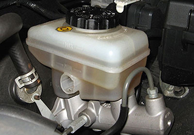 The master cylinder reservoir holds your vehicle's brake fluid.