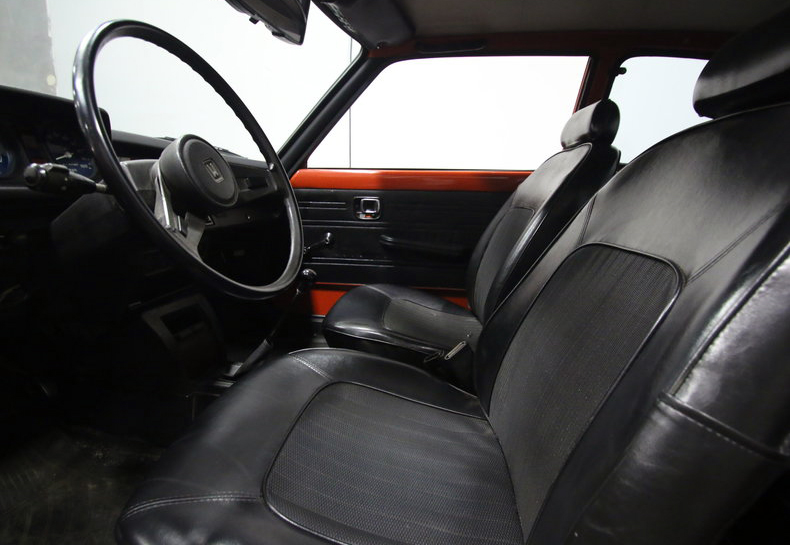 The Civic’s original interior is beautifully detailed. Note the fake wood.