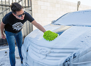 A Microfiber mitt will clean your car without scratching the finish.