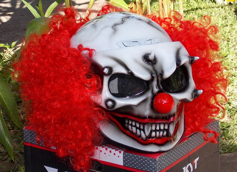 Motorcycle helmet with clown motif