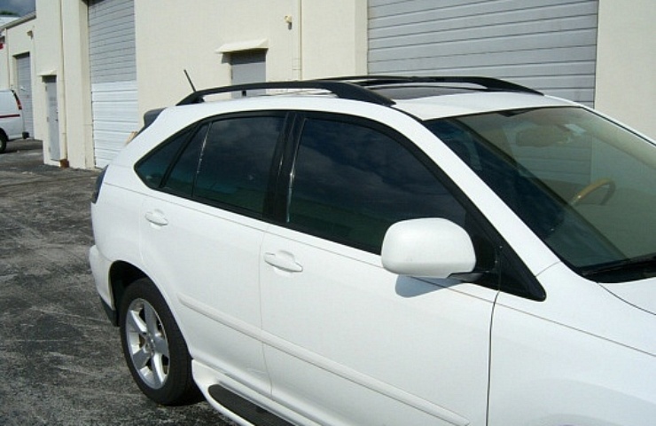 A white SUV with precut tinted windows