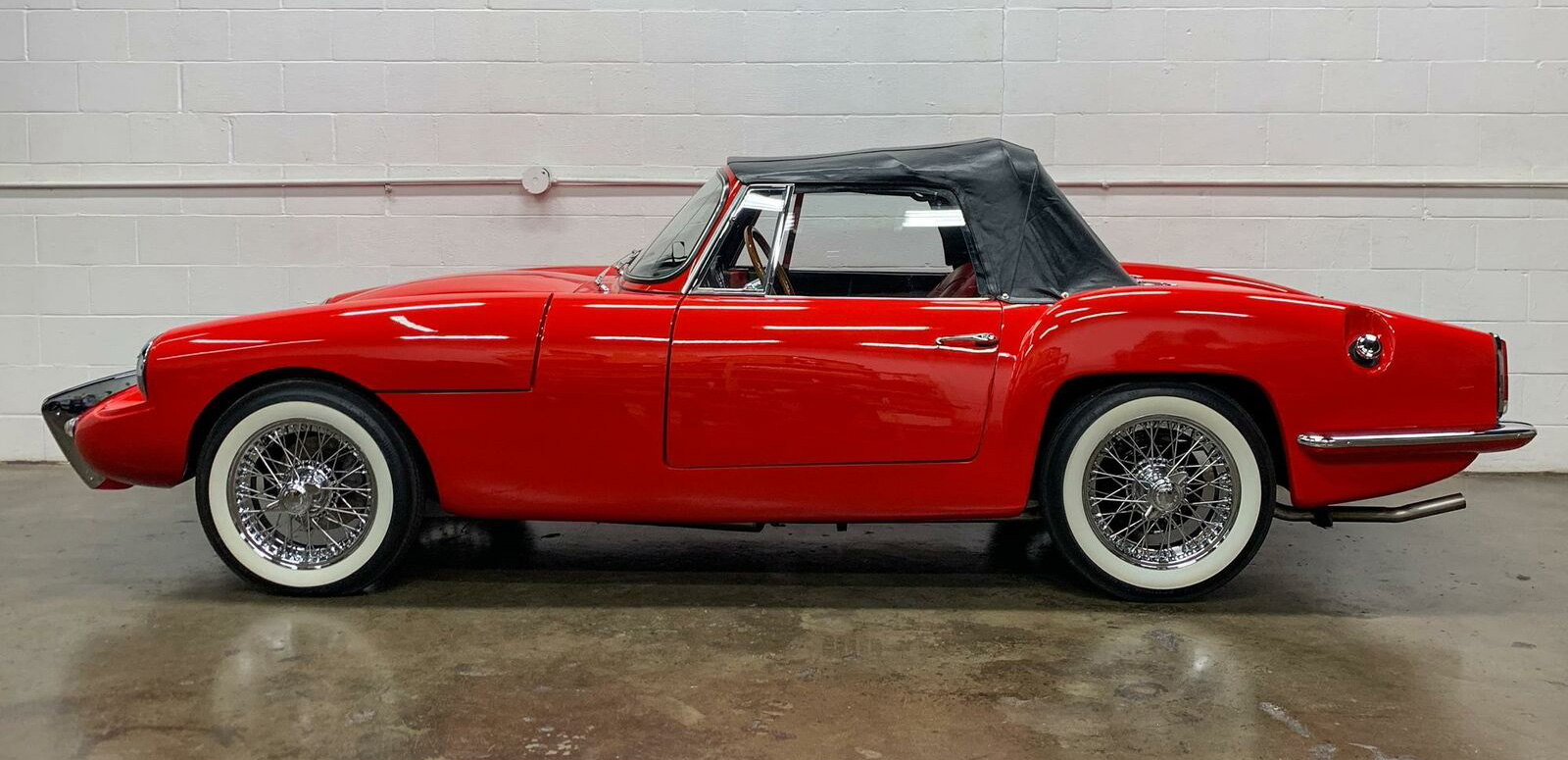This car has less than 1,000 miles and is probably the best Sabra convertible in the world.