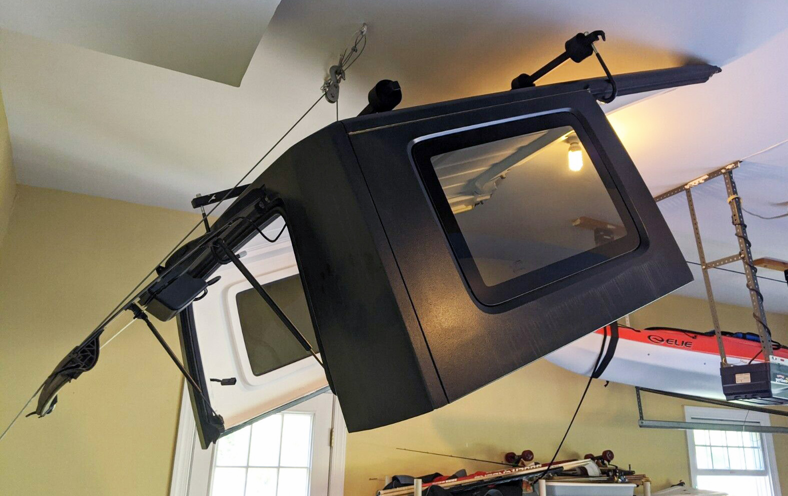 Once removed, a hardtop can be stored up close to the ceiling of the garage.