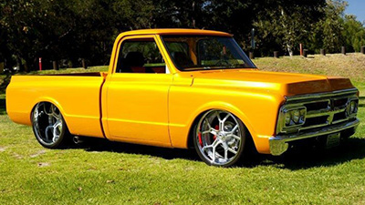 Where are the door handles? This customized GM truck has shaved doors to go along with the lowered custom look.