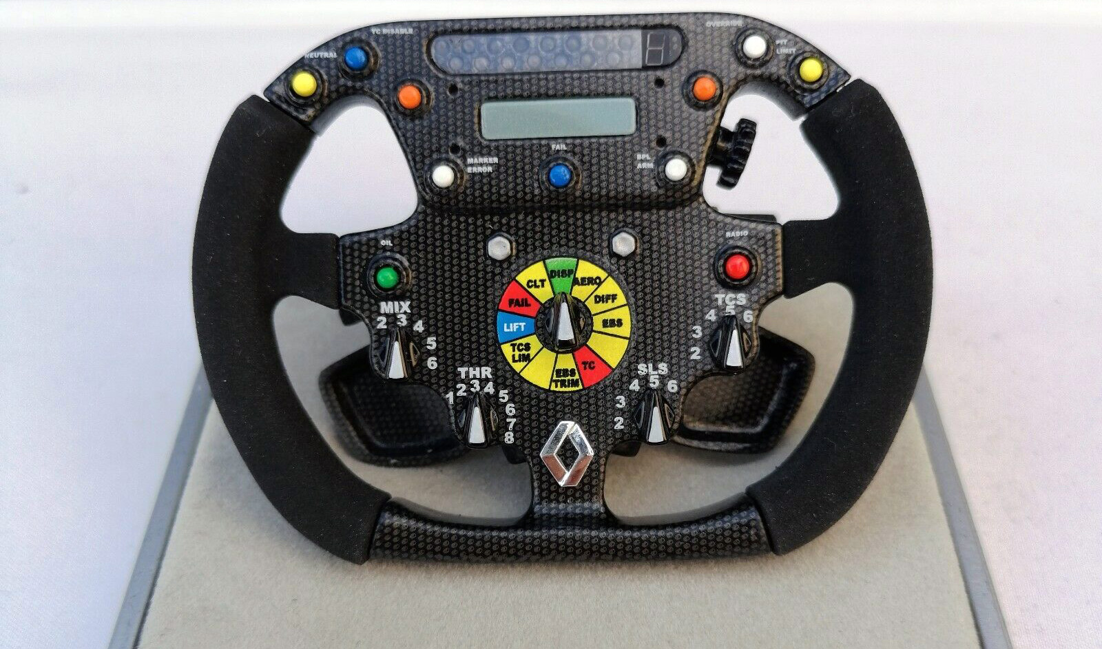 You can find a genuine F1 steering wheel on eBay.