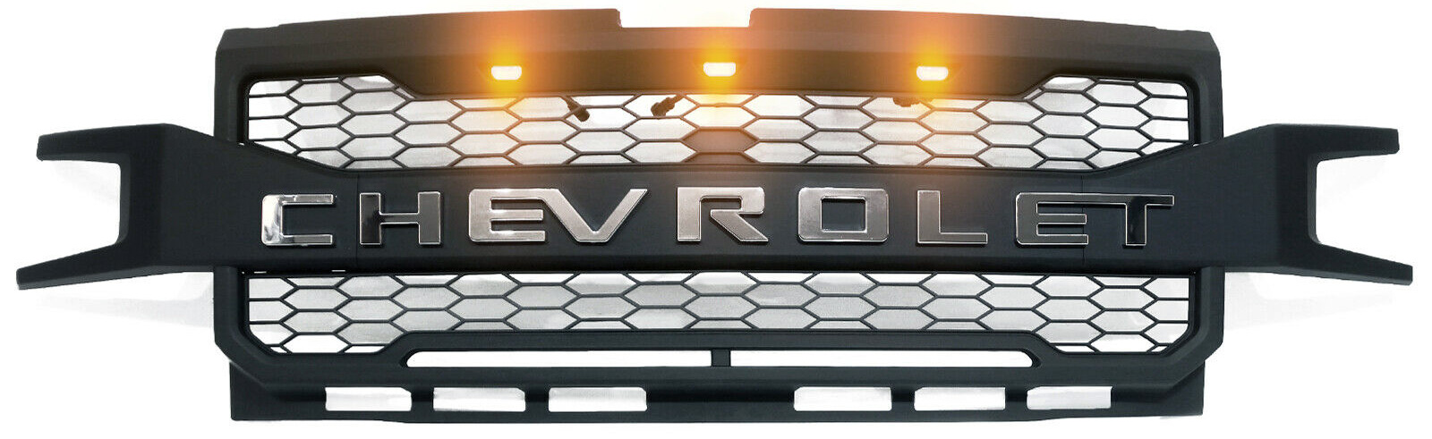 This grille makes a statement with a trio of lights and a bold Chevrolet logo.