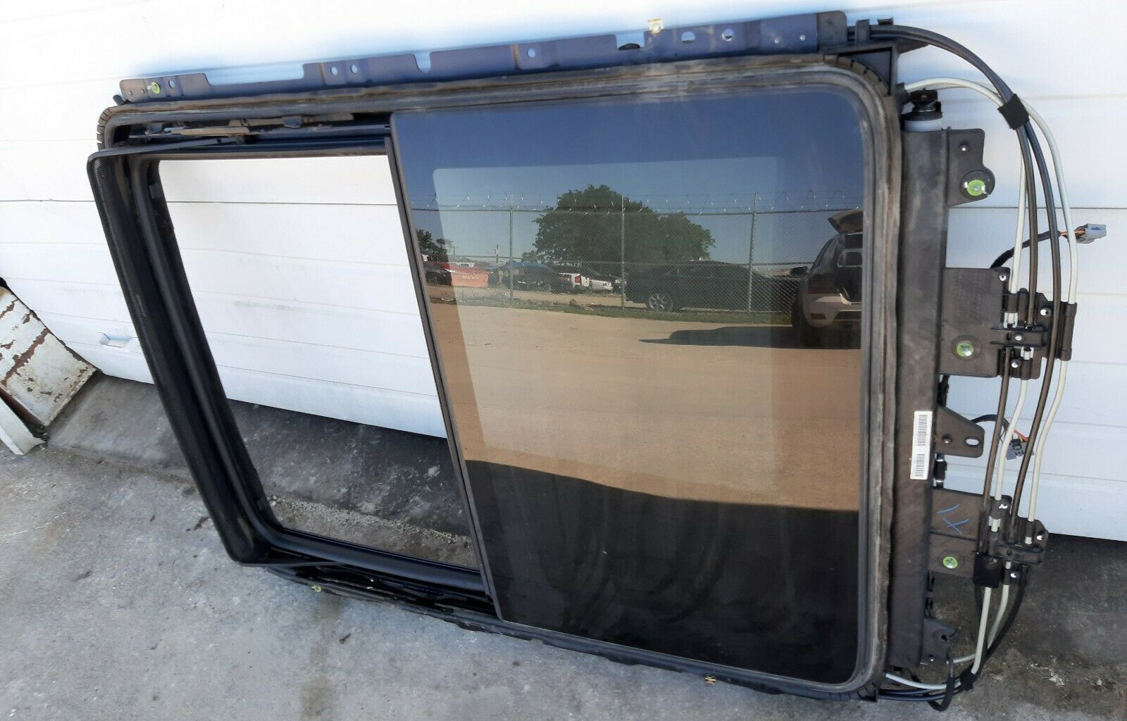 The sunroof from a Cadillac SRX.