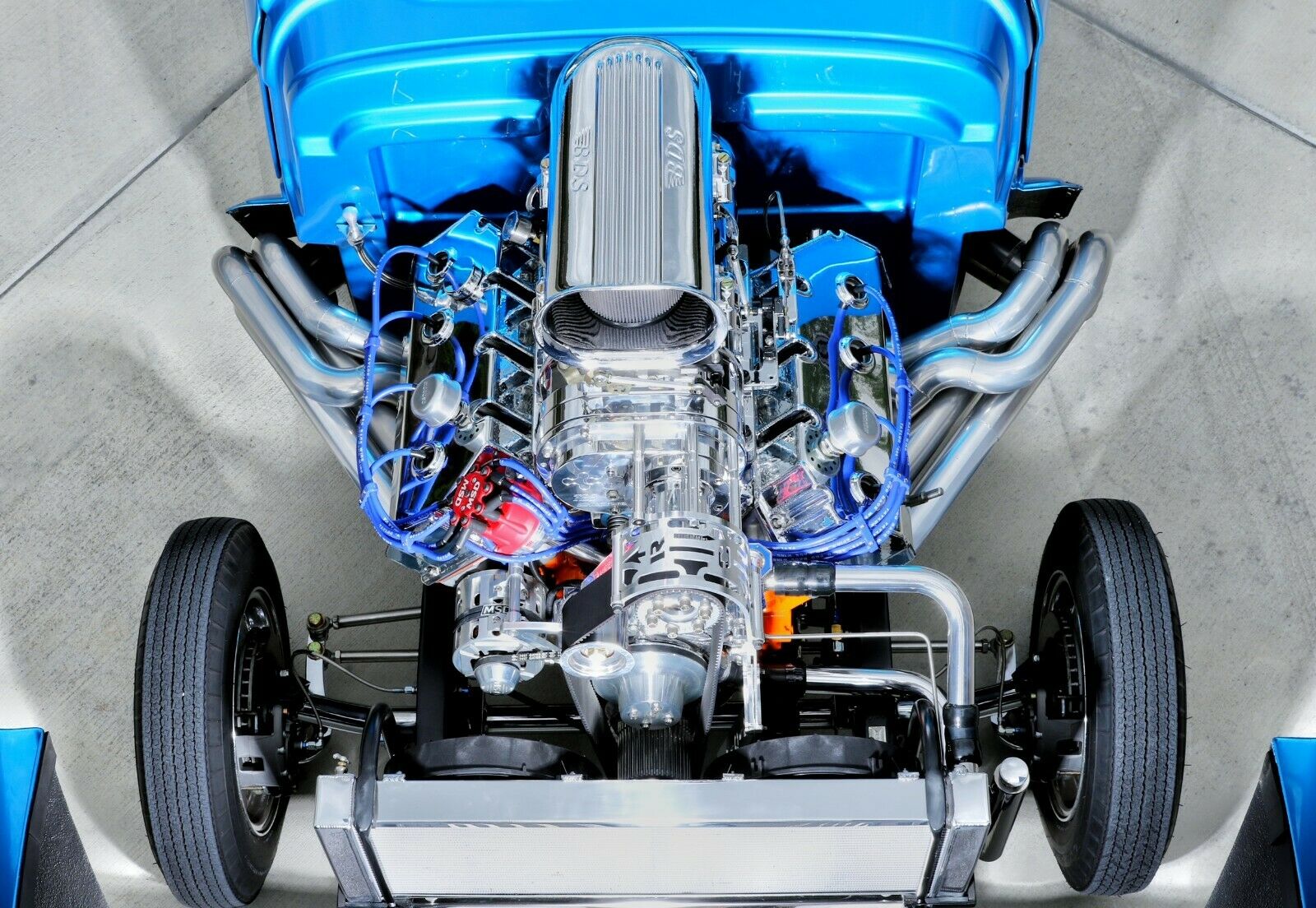 This ’40 Willys has two separate exhaust systems. The zoomies have inserts to bring down the decibles on the street.