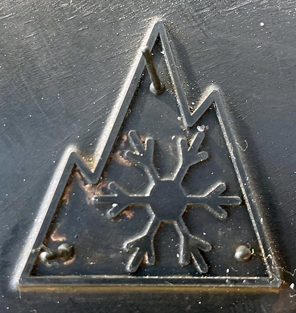 The Three-Peak symbol.