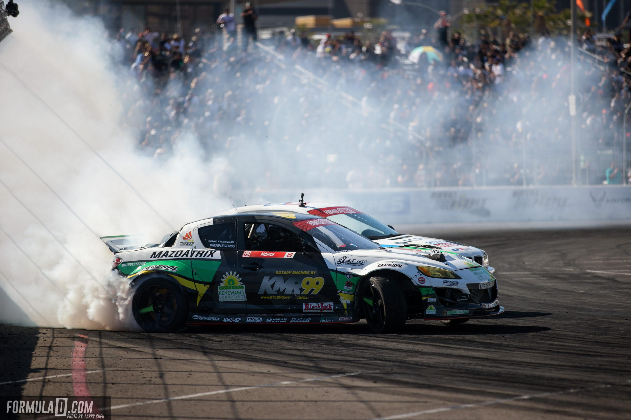 Kyle Mohan's Renewable Lubricant Mazda RX8 on a racetrack