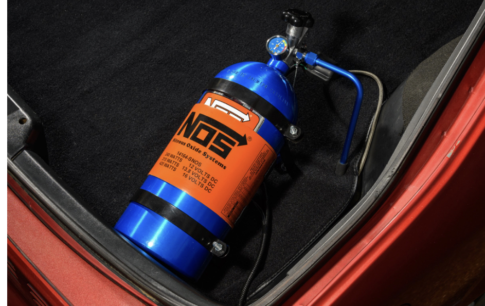 NOS Nitrous Oxide System Bottle installed in the trunk to upgrade engine power