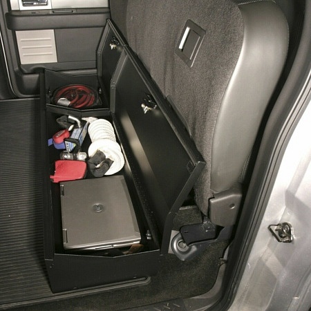 A locking under-the-seat storage unit to prevent theft from a pickup truck