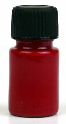 A bottle of paint for car paint repairs