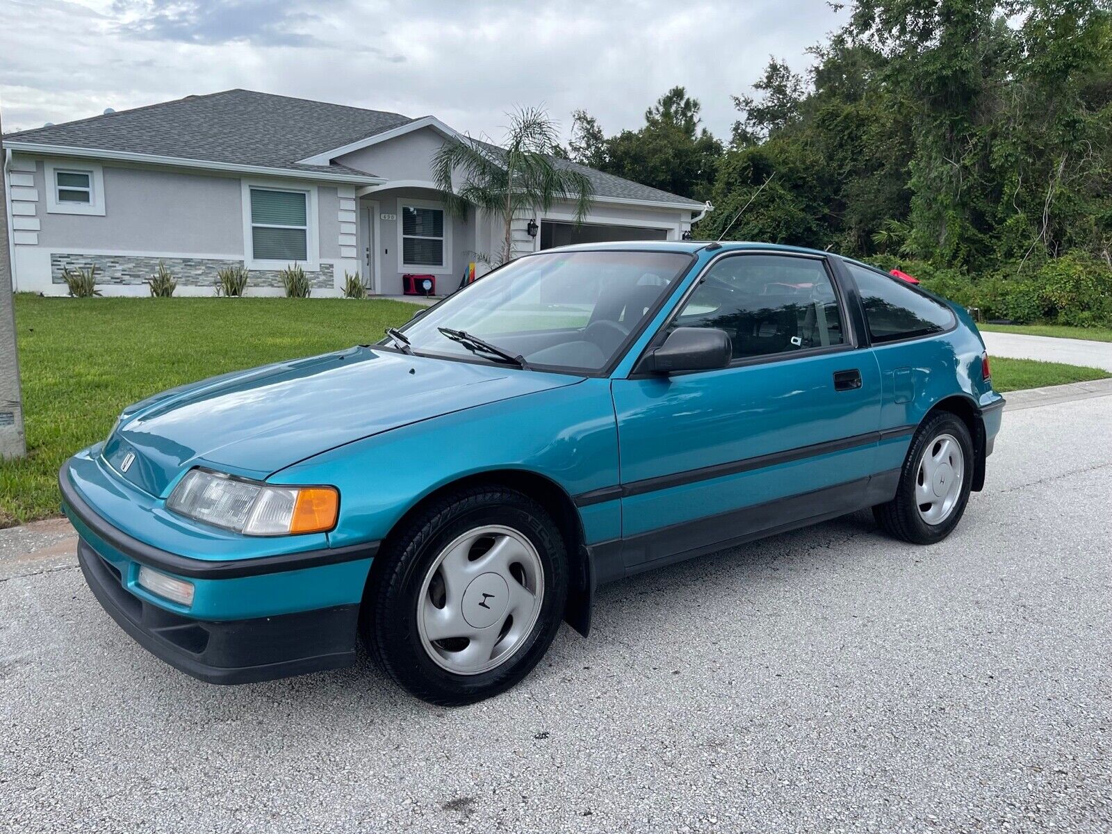 https://www.ebaymotorsblog.com/motors/blog/wp-content/uploads/2022/09/Honda_CRX_Si_left_front_profile.jpg