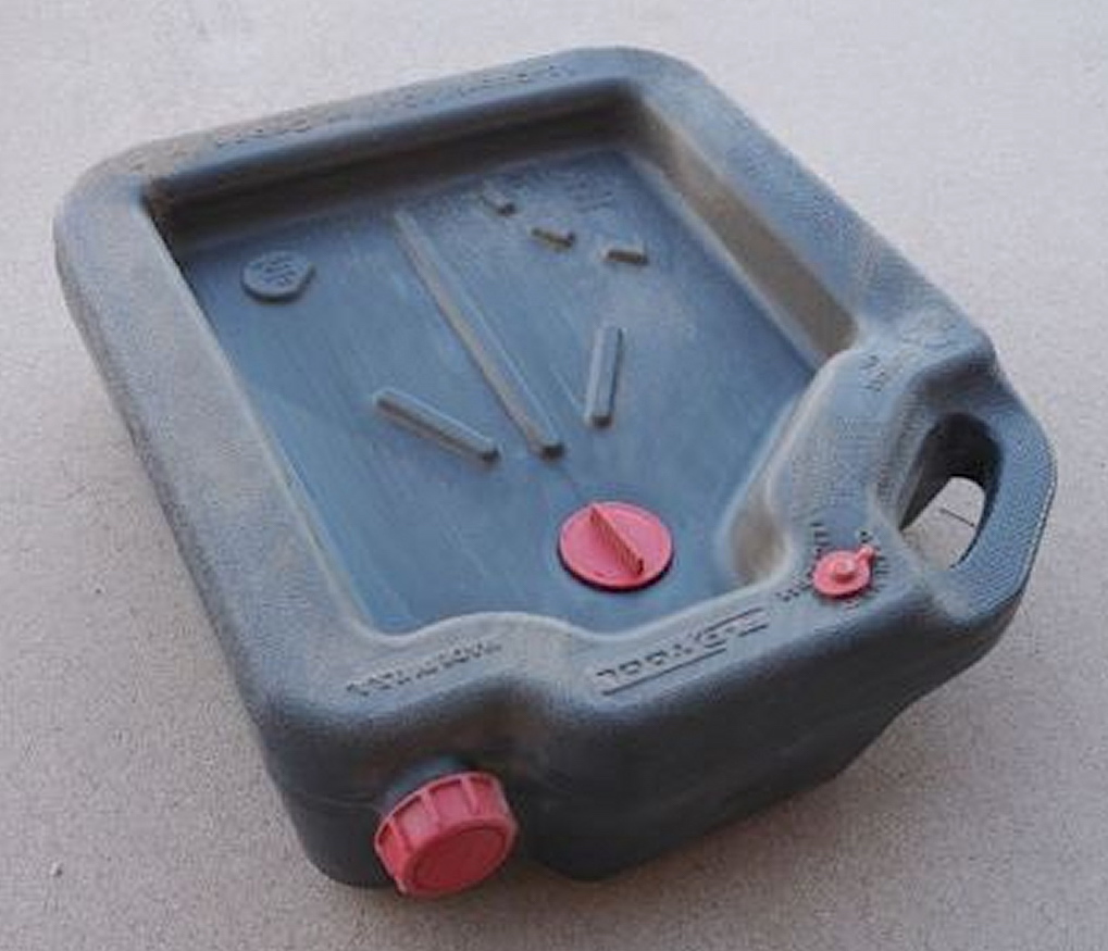 This handy oil drain pan stores old oil, avoiding those messy spills.