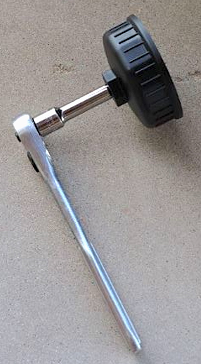 An oil filter cap and a socket wrench make it easy to remove old filters. 