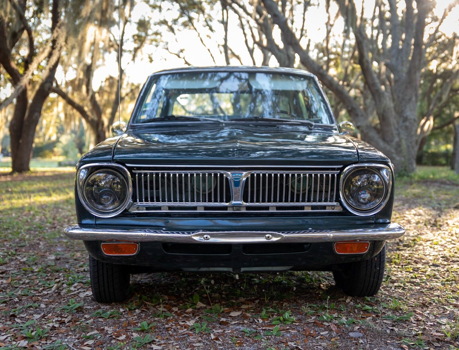 1969 Toyota Corolla - front grille, bumper, and headlights