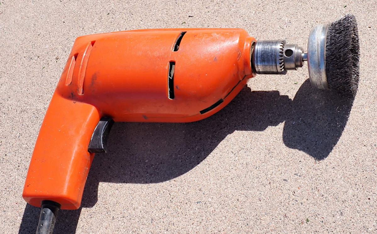 A wire drill brush makes quick work of rusty rotors.