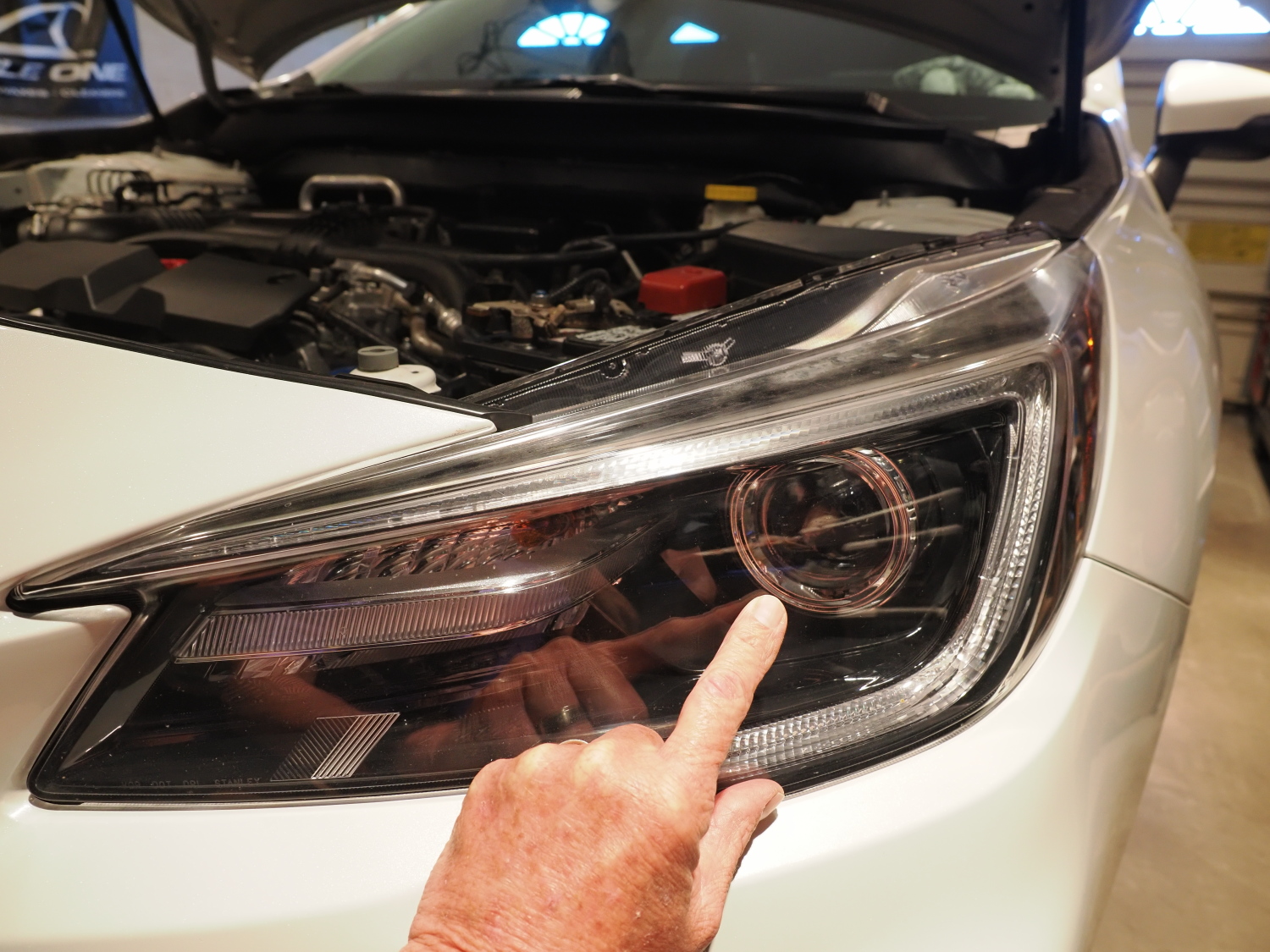 Composite assemblies only allow for headlight height adjustment.