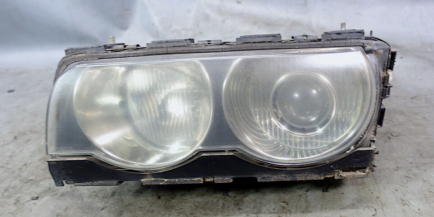 Previously owned 2001 BMW 7-Series OEM HID left headlight assembly