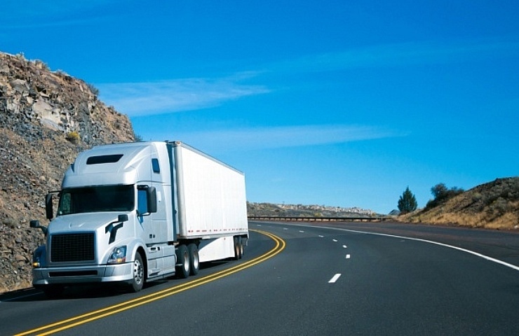 Semi-truck headed downhill using Jake brake