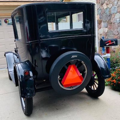 1926 Ford Model T coupe with safety triangle