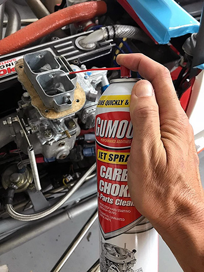 Spraying a auto parts cleaner