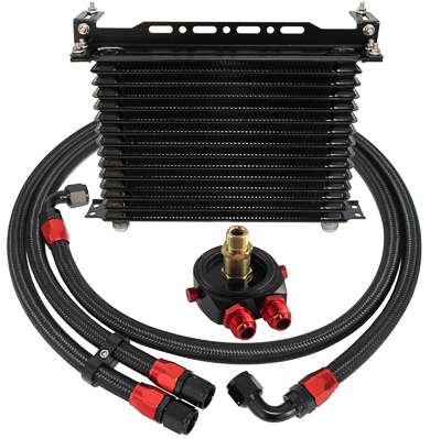 An aftermarket oil cooler kit with hoses, fittings and sandwich plate oil filter adapter