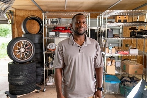 James Patrick in garage - featured