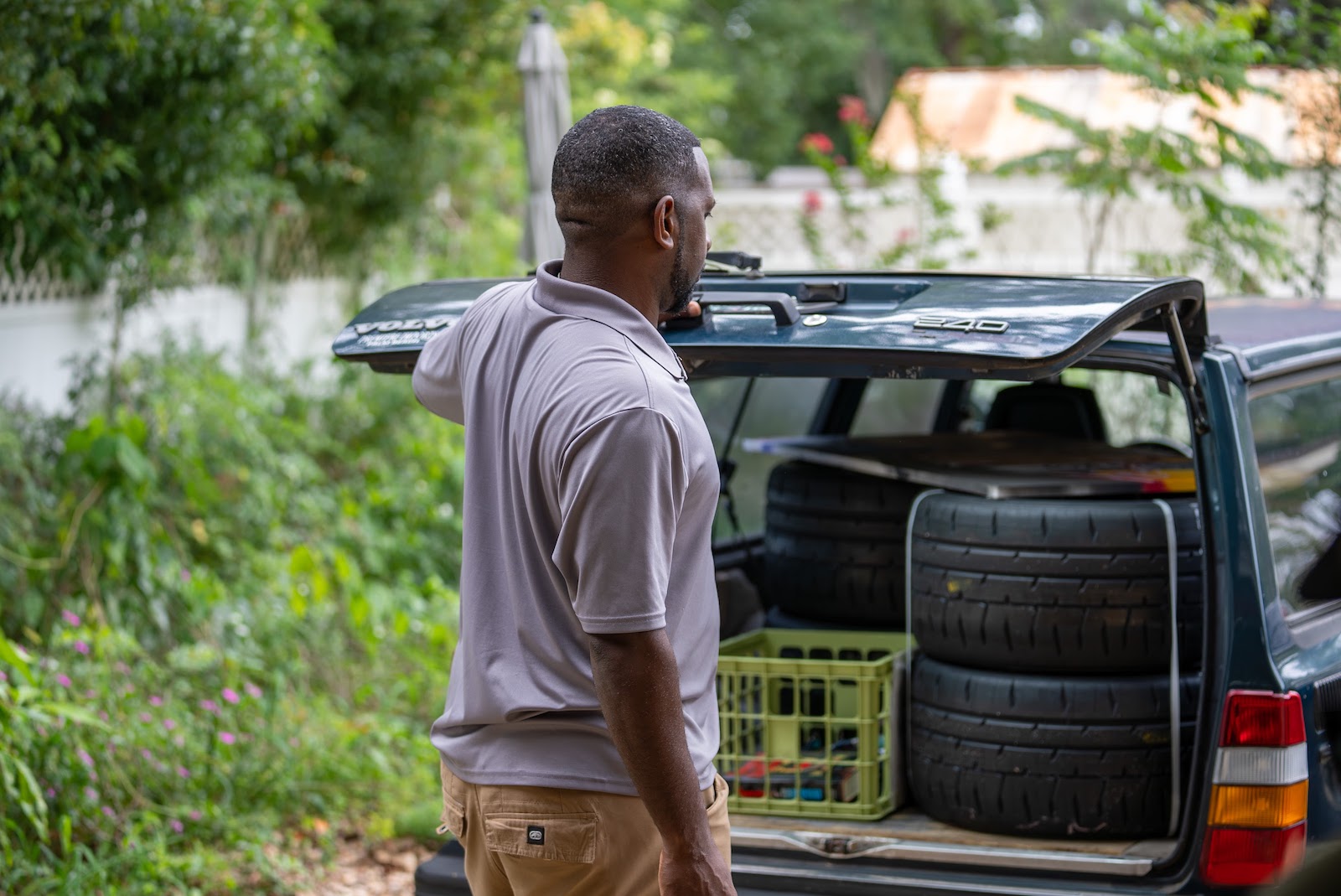 James Patrick with tires loaded in the station wagon