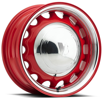 A red painted steel artillery style car wheel with a chrome beauty ring and hubcap