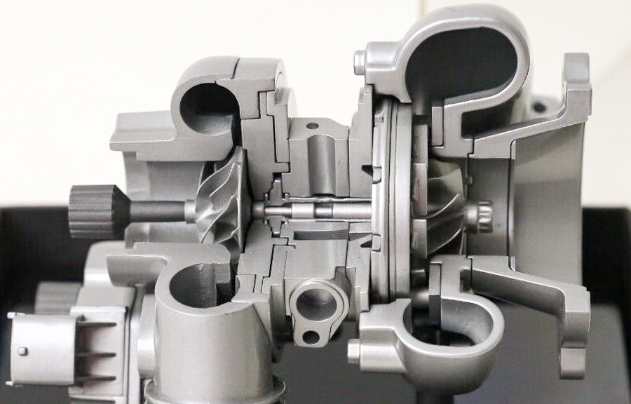 A cutaway model of a Porsche turbocharger